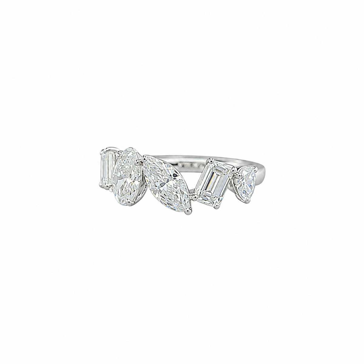 Round Brilliant Diamond Ring with Pear & Emerald Cut Side Stones